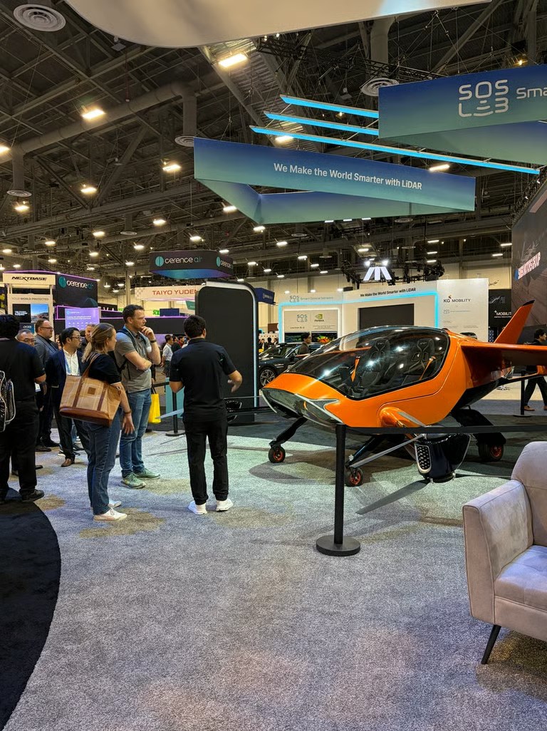 The orange eVTOL on the floor at Lift & Reach